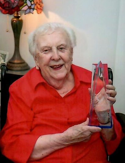 Alice Price with Hall of Fame Trophy
